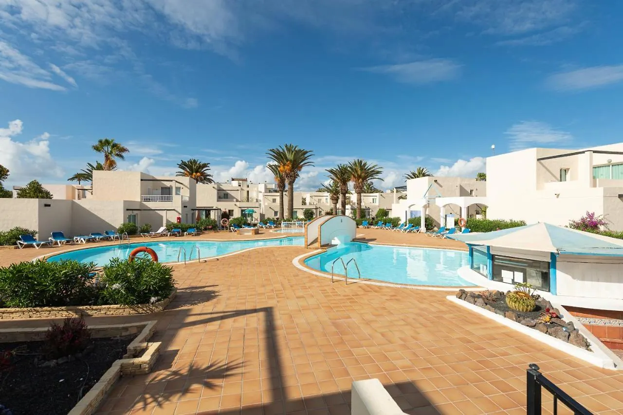 Апартаменты Homeforguest Apartamento Alisios 1 Con Piscina En Коральео