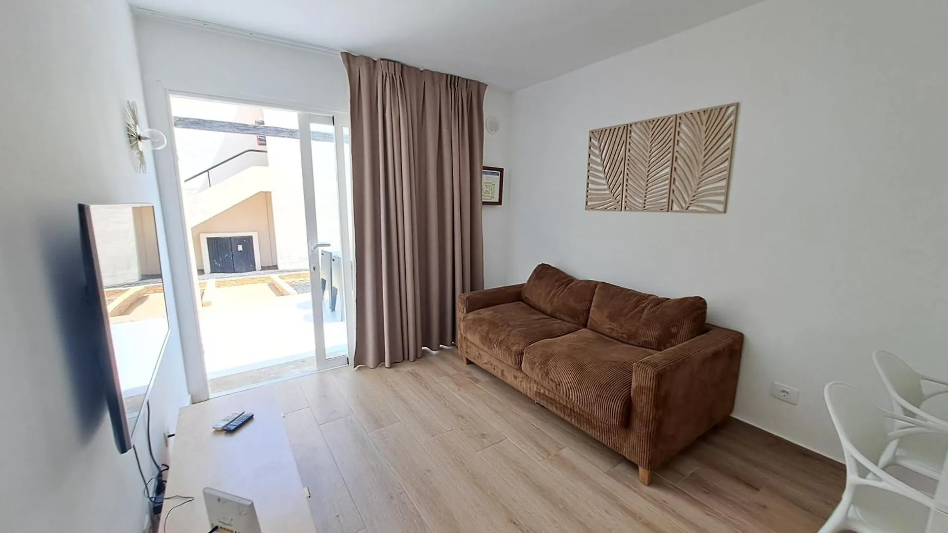Апартаменты Homeforguest Apartamento Alisios 1 Con Piscina En Коральео